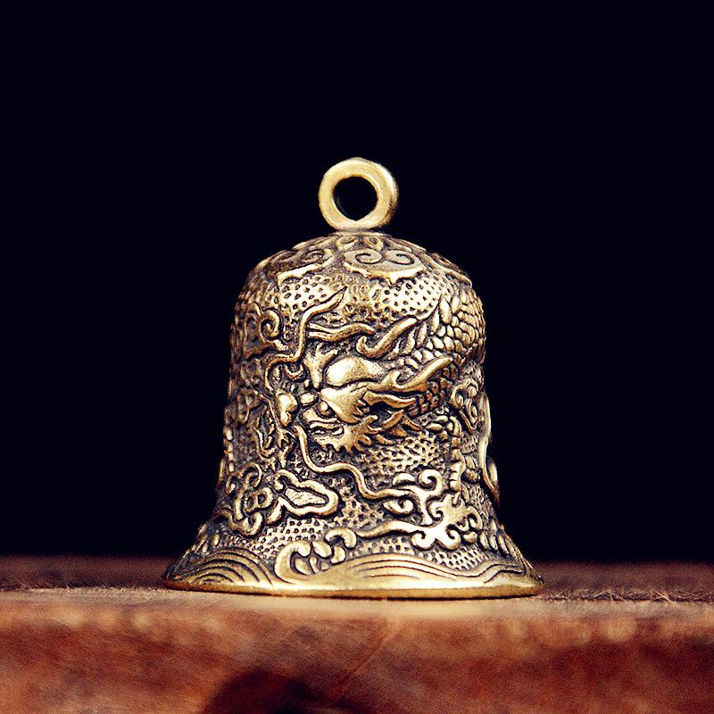 Vintage Brass Bell Carved Drag - Vintage Collectible Bells 评论和价格
