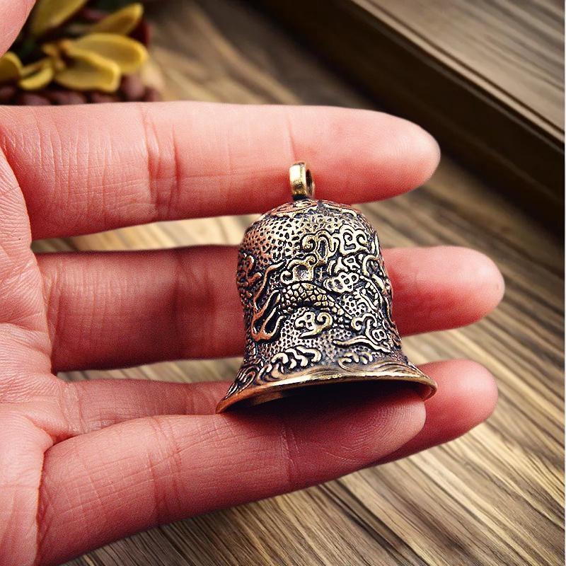 Vintage Brass Bell Carved Drag - Vintage Collectible Bells 评论和价格